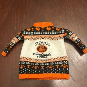 Tito’s miniature sweater